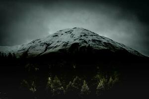 snow-filled mountain tops after a summer snowfall, in Livigno, Valtellina in the summer of 2023 photo