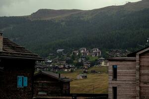 panorama of the town of Livigno, a mountain village in Valtellina on the border with Switzerland in July, summer 2023 photo