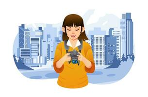 young girl photographer checking her image in digital camera, taking a picture of building in city vector