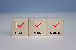 Goal plan action. Business action plan strategy concept, outline all the necessary steps to achieve your goal and help you reach your target efficiently by assigning a timeframe a start and end date. photo