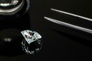 Diamond on black background photo