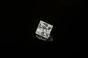 Diamond on black background photo