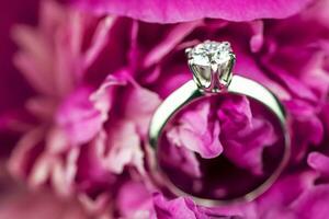 Engagement diamond ring in flower photo