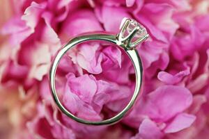Engagement diamond ring in flower photo