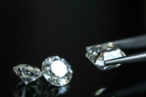 Diamonds on black background photo