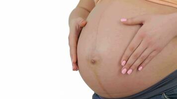 gravid kvinna diabilder händer över henne mage video