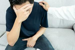 Man hold hand in front of private parts feeling discomfort and consult doctor. Venereal, testicular cancer. bladder problems, erectile dysfunction, premature ejaculation, prostate cancer photo