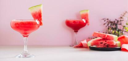 Refreshing watermelon cocktail with mint in glasses on the table web banner photo