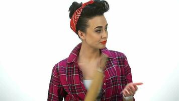 Pin up girl look on wristwatch video