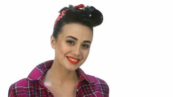 Young woman with pin-up make-up posing video