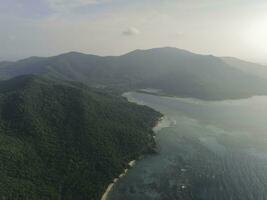 Aerial view of Karimunjawa Islands, Jepara, Indonesian archipelago, Volcano Island, coral reefs, white sand beaches. Top tourist destination, best diving snorkelling. photo