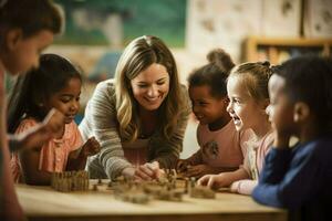 Female teacher helps school kids to finish they lesson.They sitting all together at one desk. photo