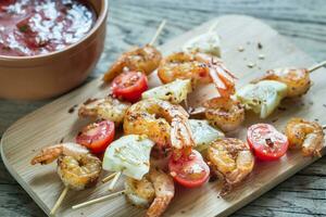 Skewers with shrimps photo