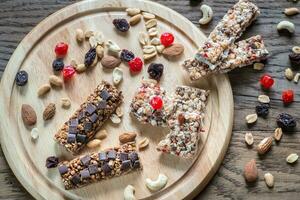 Granola bars with dried berries and chocolate photo