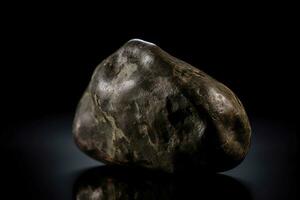 Musgravite is a rare precious natural geological stone on a black background in low key. AI generated. photo