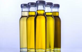 Bottles with different kinds of vegetable oil photo