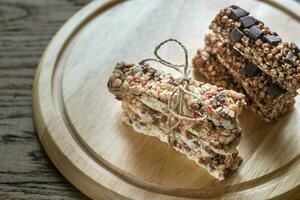 Granola bars with dried berries and chocolate photo