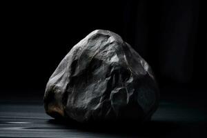 Musgravite is a rare precious natural geological stone on a black background in low key. AI generated. photo