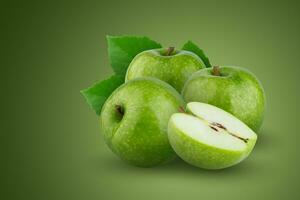 Fresh green apple isolated on green background photo