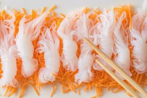 Konnyaku noodles with grated carrot photo