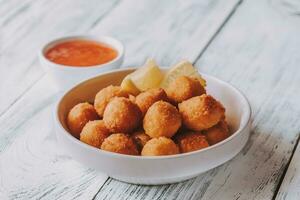 Bowl of scallop croquettes photo