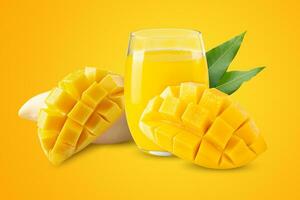 Mango fruit with mango cubes and Mango juice Isolated on a yellow background photo