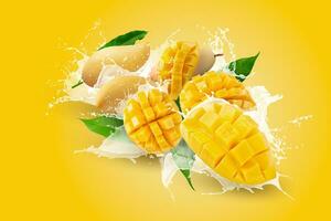 Creative layout made from Mango fruit with mango cubes and slices and Splashing on a orange background photo