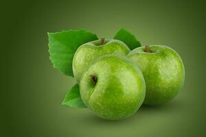 Fresh green apple isolated on green background. photo