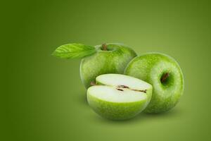 Fresh green apple isolated on green background. photo