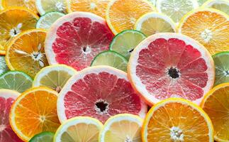 Slices of citrus fruits photo