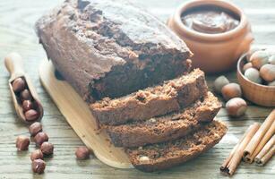 Loaf of banana-chocolate bread with chocolate cream photo