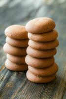 Chocolate biscuits on the wooden table photo