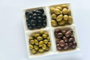 Assortment of olives top view photo