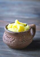 Bowl of ghee clarified butter photo