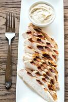 Grilled chicken with tahini sauce photo
