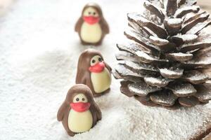 Chocolate candies in the shape of penguins photo