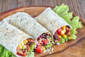 Three chicken burritos photo