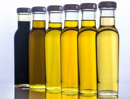 Bottles with different kinds of vegetable oil photo