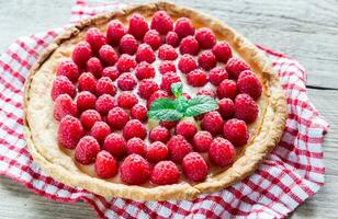 Raspberry tart with custard photo