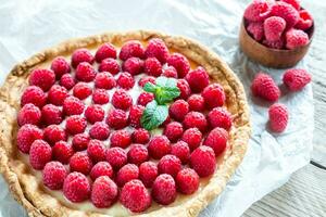 Raspberry tart with custard photo