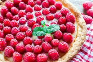 Raspberry tart with custard photo