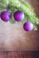 Christmas tree branch with ornaments photo