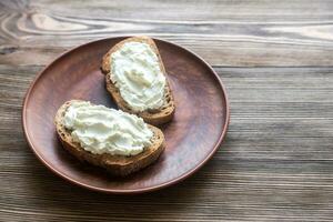 Toasts with cream cheese photo