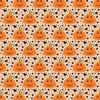 Seamless pattern with pumpkins and black hearts for Halloween. vector