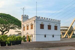 Square Tower, a former prison and now a clock tower in Kuching, Sarawak, Malaysia photo