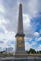 France, Paris, 20.08.2023,The Luxor Obelisks are a pair of ancient Egyptian obelisks, over 3,000 years old, carved to stand either side of the portal of the Luxor Temple in the reign of Ramesses II photo