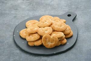 Tasty Almond Cookies with heart shape photo