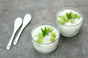 Pandan Coconut Dessert, made from jelly, nata de coco, pandan leaf and coconut. Indonesian dessert photo