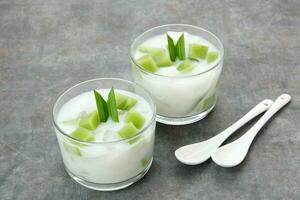 Pandan Coconut Dessert, made from jelly, nata de coco, pandan leaf and coconut. Indonesian dessert photo