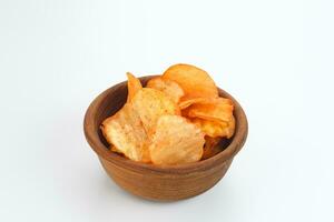 Potato Chips, served in bowl on white background. photo